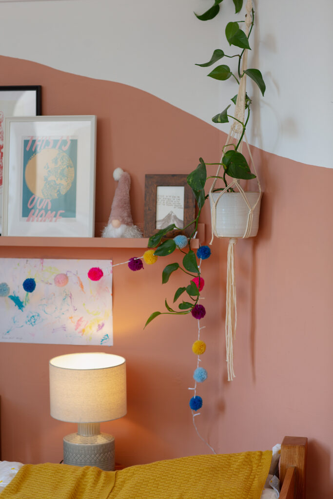 A child's room is eco-friendly as it is lit by a lamp with an LED bulb.