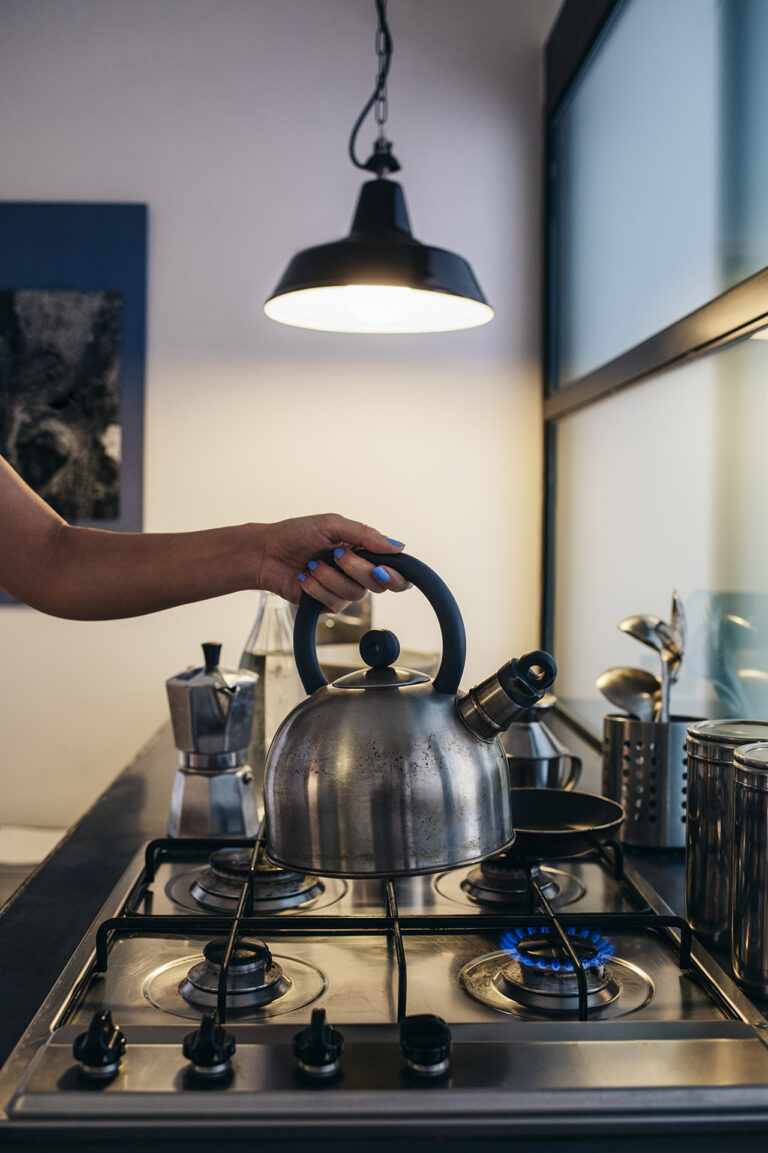 Kettle being heated with green gas