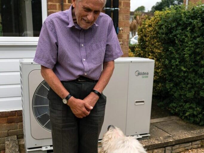Sustainable lifestyle guide. Man who has switched to a heat pump. 