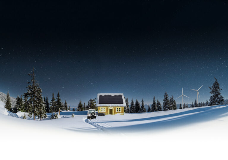 A small house with solar panels on its roof sits in a snowy landscape at night, surrounded by pine trees, a car, and distant wind turbines under a starry sky.